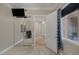 Bedroom with a TV on the wall, large closet, and window to the outside balcony at 15 Via Mantova # 303, Henderson, NV 89011
