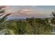 Distant mountain views and desert foliage fill the background at 15 Via Mantova # 303, Henderson, NV 89011