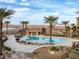 Swimming pool in community featuring desert landscaping and lake views at 15 Via Mantova # 303, Henderson, NV 89011