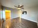 Comfortable bedroom featuring a ceiling fan and an adjacent walk-in closet at 1501 Lake Placid Ter # 0, Henderson, NV 89014