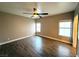 Spacious bedroom with a ceiling fan and beautiful hardwood floors at 1501 Lake Placid Ter # 0, Henderson, NV 89014