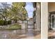 Backyard featuring a built-in grill, covered patio, lush landscaping, and manicured lawn at 1901 Rosemere Ct, Las Vegas, NV 89117