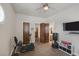 Bright exercise room features ample space, gym equipment, and access to ensuite bath at 1901 Rosemere Ct, Las Vegas, NV 89117