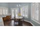 Sunlit breakfast nook with French doors and shuttered windows at 1901 Rosemere Ct, Las Vegas, NV 89117