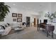 Comfortable living room with a cozy sectional couch and a grand piano at 1901 Rosemere Ct, Las Vegas, NV 89117