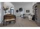 Open living room with lots of light, a sofa, piano, and hardwood flooring at 1901 Rosemere Ct, Las Vegas, NV 89117