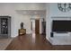 Entryway to a bright home with hardwood floors and an open floorplan with living and dining areas at 1901 Rosemere Ct, Las Vegas, NV 89117