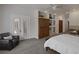 Main bedroom boasting built-in shelving, a ceiling fan, and access to an outdoor space at 1901 Rosemere Ct, Las Vegas, NV 89117