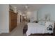 Spacious main bedroom features a fireplace and built in shelving and cabinetry at 1901 Rosemere Ct, Las Vegas, NV 89117