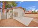 Beautiful backyard with a covered patio, desert landscaping and lots of sunshine at 2218 Ramsgate Dr # 0, Henderson, NV 89074