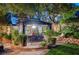 Beautiful backyard with a cozy gazebo dining area, lush landscaping, and an inviting ambiance, ideal for outdoor gatherings at 2236 Midvale Ter, Henderson, NV 89074