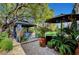 Enjoy relaxing in this backyard with a gazebo, comfortable seating, and lush landscaping at 2236 Midvale Ter, Henderson, NV 89074