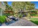 Outdoor living space featuring paver patio, pergola, and lounge seating at 2236 Midvale Ter, Henderson, NV 89074
