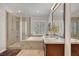Elegant bathroom with a glass shower and soaking tub at 2236 Midvale Ter, Henderson, NV 89074