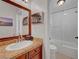 Bathroom featuring single sink vanity, granite countertop, and enclosed shower at 2236 Midvale Ter, Henderson, NV 89074