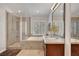 Bathroom featuring glass enclosed shower, soaking tub and granite countertops at 2236 Midvale Ter, Henderson, NV 89074