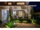 Charming front porch with landscaped yard, and a cozy seating area at 2236 Midvale Ter, Henderson, NV 89074