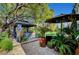Charming outdoor gazebo with patio and lush landscaping creating a serene backyard retreat at 2236 Midvale Ter, Henderson, NV 89074