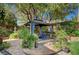 Charming gazebo surrounded by lush greenery and decorative planters, perfect for outdoor gatherings at 2236 Midvale Ter, Henderson, NV 89074