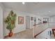 Upstairs hallway with carpet and plant at 2236 Midvale Ter, Henderson, NV 89074