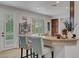 Stylish kitchen featuring granite countertops, stainless steel appliances, and breakfast bar with seating at 2236 Midvale Ter, Henderson, NV 89074