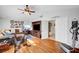 Recreation room boasting vaulted ceilings, wood floors, home gym, and lounge area at 2236 Midvale Ter, Henderson, NV 89074