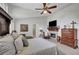 Inviting main bedroom featuring a fireplace and cozy seating area at 2236 Midvale Ter, Henderson, NV 89074