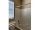 Bathroom featuring a toilet and bathtub with white tiles at 2461 Brooklyn Bridge St, Las Vegas, NV 89135
