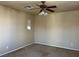Bedroom featuring a ceiling fan with carpet flooring and natural light from a window at 2461 Brooklyn Bridge St, Las Vegas, NV 89135