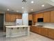 Bright kitchen featuring ample cabinet space and a functional center island at 2461 Brooklyn Bridge St, Las Vegas, NV 89135