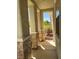 Inviting covered porch featuring stone-accented columns at 2461 Brooklyn Bridge St, Las Vegas, NV 89135