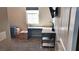 Bedroom with a functional workspace, complete with a desk and mounted television at 2629 Monte Cevedale St, Henderson, NV 89044