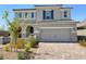 Beautiful two-story home with a brick driveway and a large two car garage at 2629 Monte Cevedale St, Henderson, NV 89044