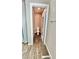 Toilet room with wood-look tile flooring and a window for natural light at 2629 Monte Cevedale St, Henderson, NV 89044