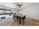 Bright dining room with a modern table set and view of the well maintained backyard at 2637 Rialto Rd, Las Vegas, NV 89108