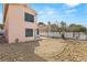 The backyard offers a spacious area with potential for landscaping and outdoor activities, complemented by the home's stucco exterior at 2802 Secret Canyon Rd, Las Vegas, NV 89074