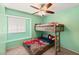 Bedroom with a bunk bed and a window at 2802 Secret Canyon Rd, Las Vegas, NV 89074