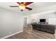 The living room with TV and hardwood floors at 2802 Secret Canyon Rd, Las Vegas, NV 89074