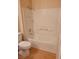 Bathroom featuring a shower-tub combo with white tile and modern fixtures at 3318 N Decatur Blvd # 1059, Las Vegas, NV 89130