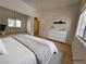 Bright bedroom with neutral tones, wood floors, and large windows for natural light at 3318 N Decatur Blvd # 1059, Las Vegas, NV 89130
