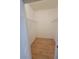 Walk-in closet with wire shelving for storage and wood-look floors at 3318 N Decatur Blvd # 1059, Las Vegas, NV 89130