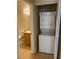 Convenient laundry closet featuring a stacked washer and dryer unit at 3318 N Decatur Blvd # 1059, Las Vegas, NV 89130
