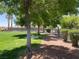 Community park with lush greenery, walking path, and mature trees at 3318 N Decatur Blvd # 1059, Las Vegas, NV 89130