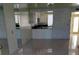 Open living space with tile flooring and access to the updated kitchen at 3436 Pino Cir, Las Vegas, NV 89121