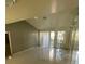 Spacious living area with tile flooring, high ceilings, and plenty of natural light at 3436 Pino Cir, Las Vegas, NV 89121