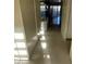 Open living space with tile flooring and access to the kitchen at 3436 Pino Cir, Las Vegas, NV 89121