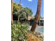 Community pool surrounded by lush greenery and palm trees at 3436 Pino Cir, Las Vegas, NV 89121