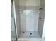 Modern shower featuring stylish tile accents and a glass enclosure at 3436 Pino Cir, Las Vegas, NV 89121