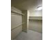A functional walk-in closet with shelves and hanging rods at 3436 Pino Cir, Las Vegas, NV 89121