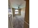 Bedroom featuring neutral carpeting, chair rail, natural light, and ceiling fan at 3917 White Castle St, Las Vegas, NV 89129